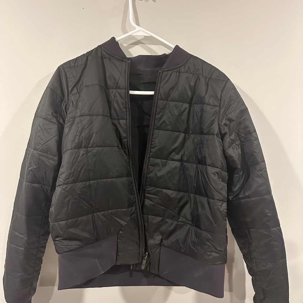 Black Puffer Jacket with Quilted Design and Ribbed Details